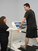 Registered Nurse Lisa Lofty
conducts a fitness exam 
complete with a treadmill
and bike test  with Nuclear
Security Shift Manager Zachary
Baze at TVAs Sequoyah
Nuclear Plant, Tenn.